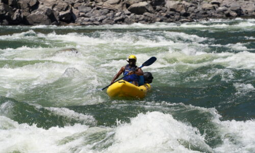 Sherman Neal II rafting down the wild and scenic Salmon River, Idaho