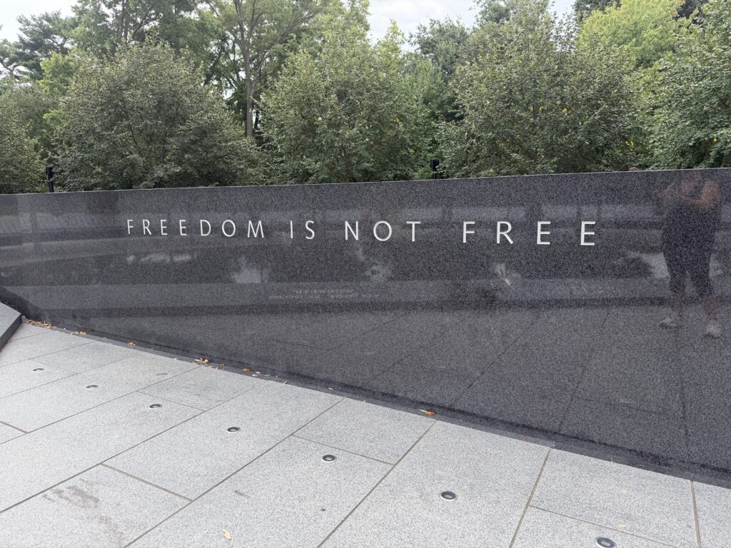 KWM - Wall The words Freedom Is Not Free inlaid in silver on granite at the Korean War Veterans Memorial