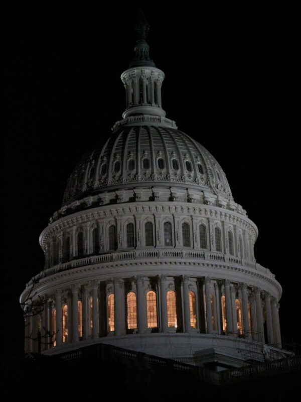 The dome of the United States Capitol lit at night