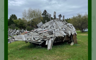 Image of a dinosaur made with scrap wood